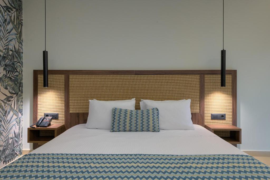 Voodi või voodid majutusasutuse Oceanis Park Hotel toas