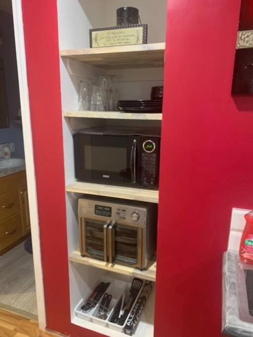 A kitchen or kitchenette at Cozy Lodge Suite