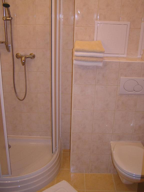 Koupelna v ubytování Gonda Apartments