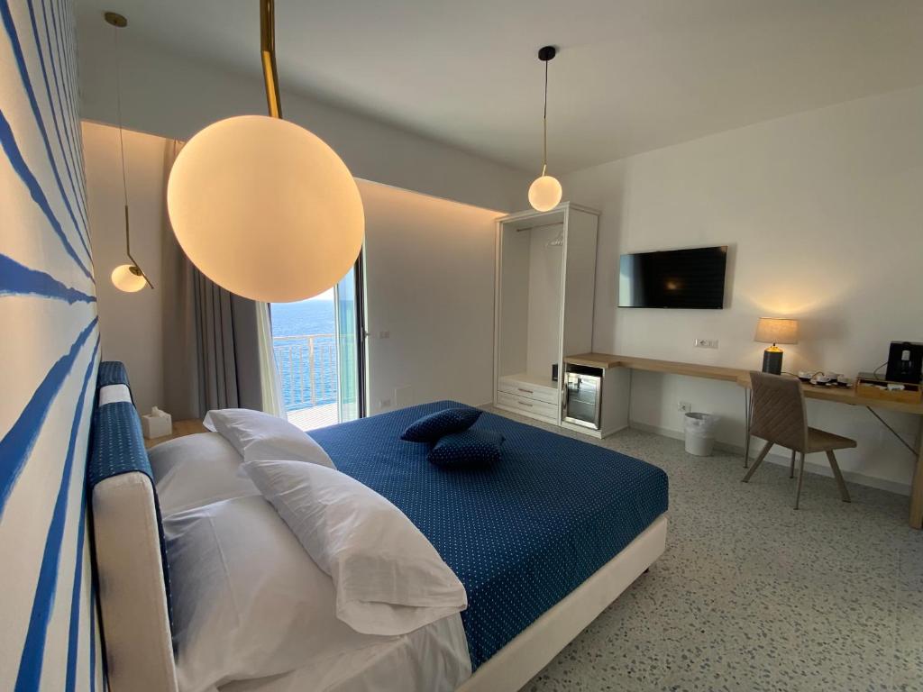 Ένα ή περισσότερα κρεβάτια σε δωμάτιο στο Calanca Rooms