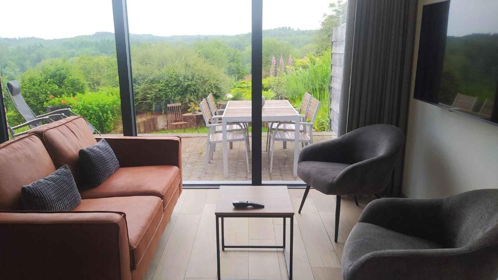 Posezení v ubytování B&B Plattestien