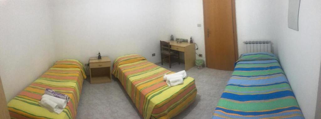 Postel nebo postele na pokoji v ubytování Dal Contadino
