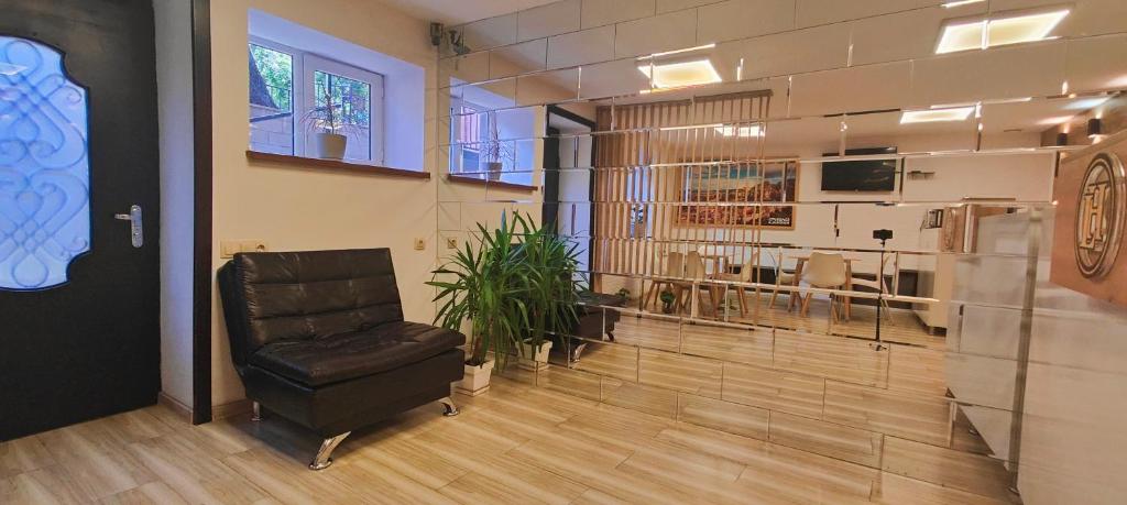 TV a/nebo společenská místnost v ubytování Light Hotel