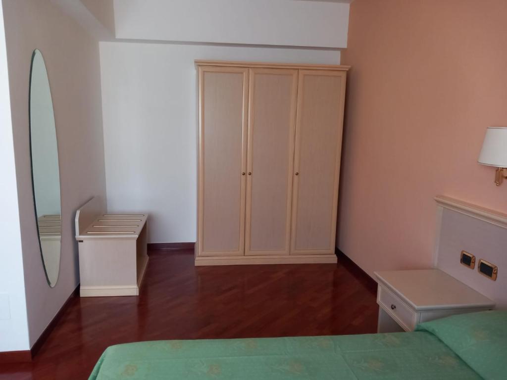 Postel nebo postele na pokoji v ubytování Alma Hotel San Giorgio