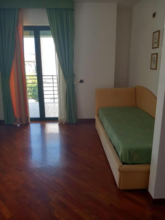 Postel nebo postele na pokoji v ubytování Alma Hotel San Giorgio