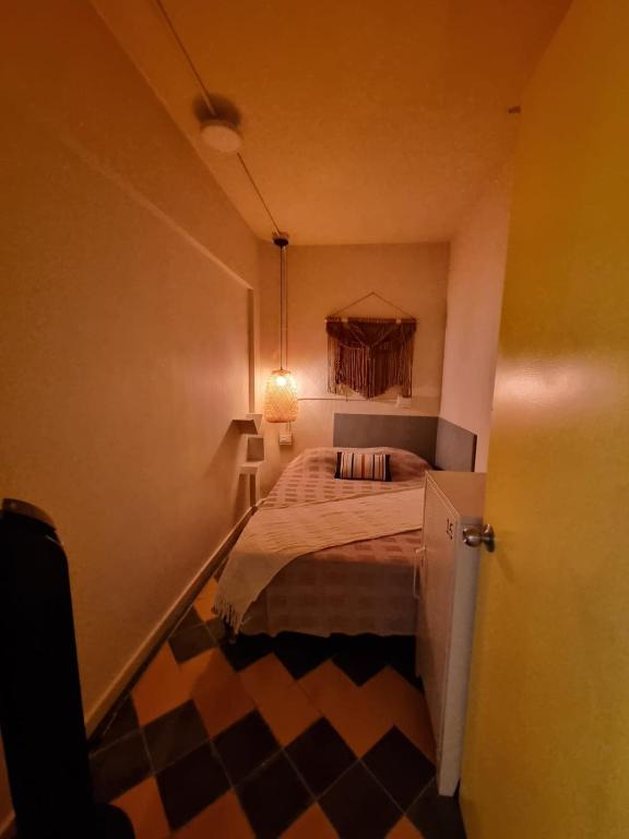 Postel nebo postele na pokoji v ubytování Mascomunal hostel