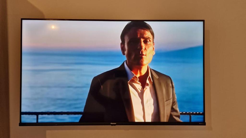 TV a/nebo společenská místnost v ubytování TRICASE Home
