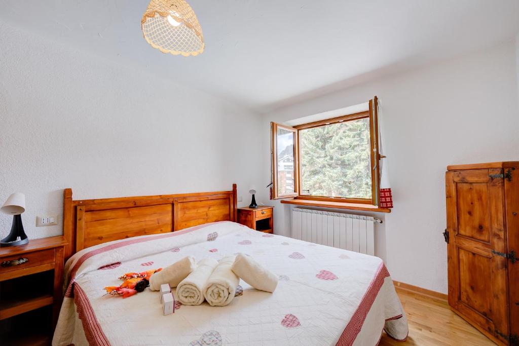 Posteľ alebo postele v izbe v ubytovaní Miramonti 21 Ski In - Ski Out - Happy Rentals