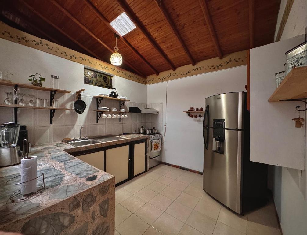 Kuchyň nebo kuchyňský kout v ubytování Casa Amaru