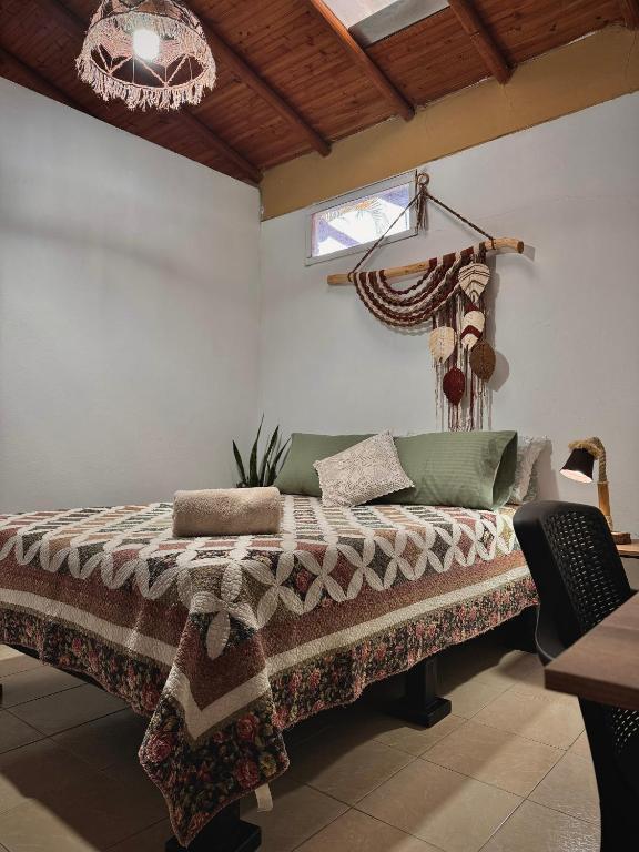 Postel nebo postele na pokoji v ubytování Casa Amaru
