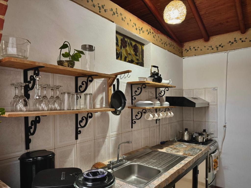 Kuchyň nebo kuchyňský kout v ubytování Casa Amaru