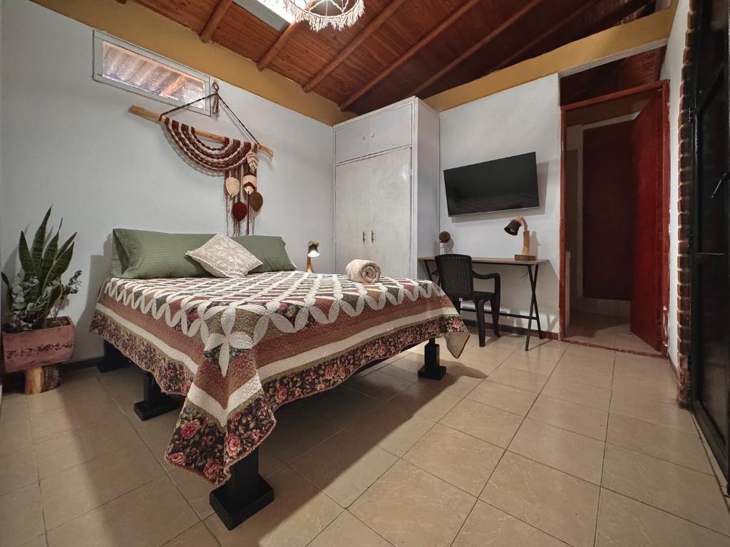 Postel nebo postele na pokoji v ubytování Casa Amaru