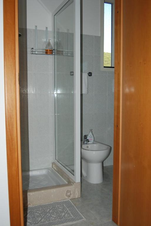 Koupelna v ubytování Mini Red Hub - Design Apartment