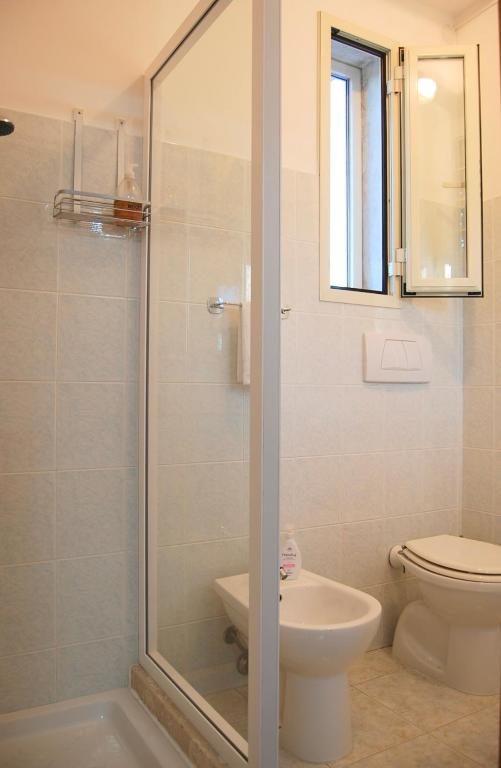 Koupelna v ubytování Mini Red Hub - Design Apartment