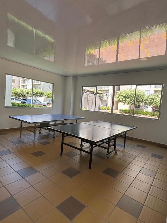 Stolní tenis v ubytování Apartamento de descanso Peñalisa Ricaurte nebo okolí