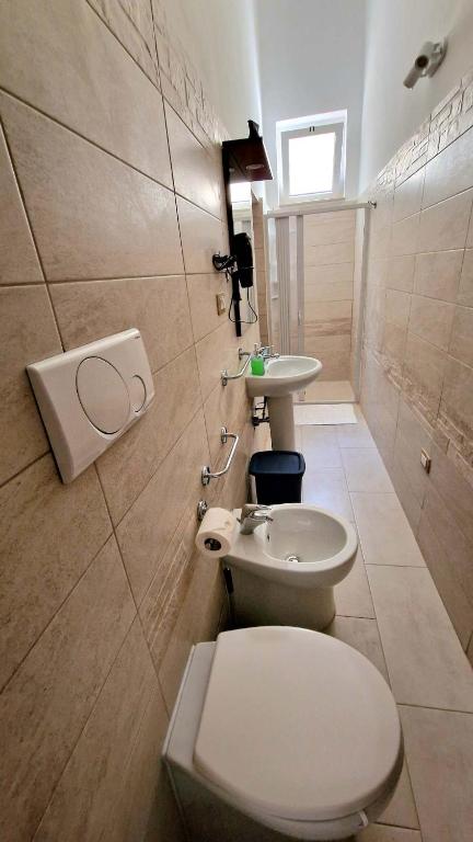 Koupelna v ubytování TRICASE Home