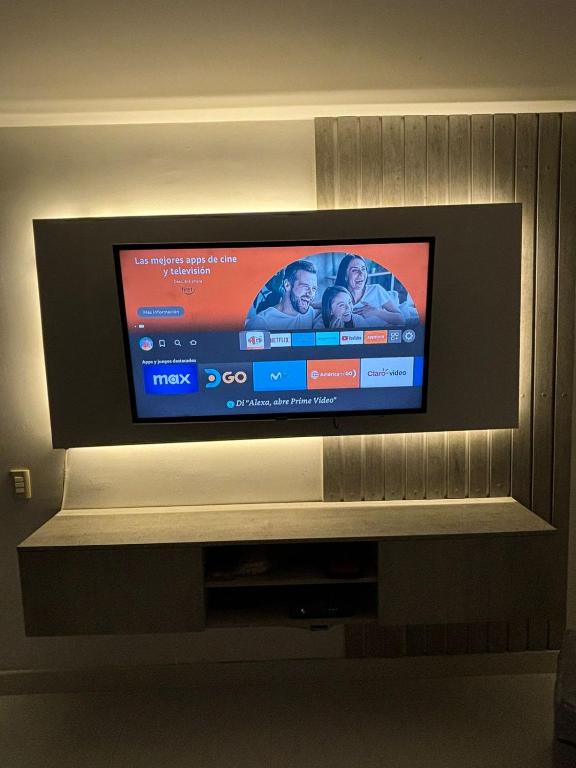 TV a/nebo společenská místnost v ubytování Apartamento de descanso Peñalisa Ricaurte