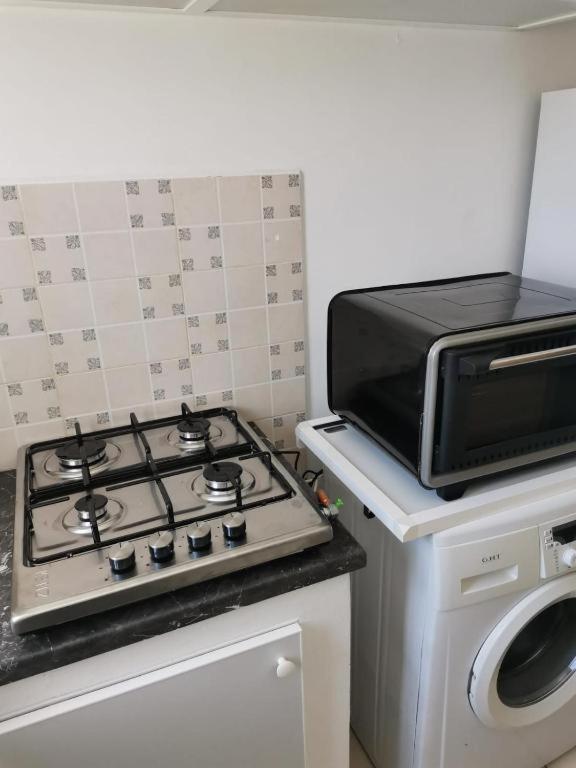 Kuchyň nebo kuchyňský kout v ubytování Appartement F3 en location d'été