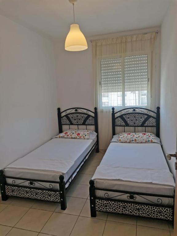 Postel nebo postele na pokoji v ubytování Appartement F3 en location d'été