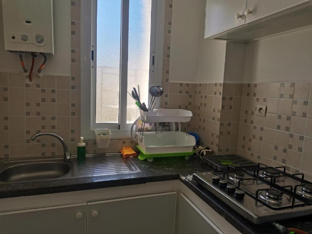 Kuchyň nebo kuchyňský kout v ubytování Appartement F3 en location d'été