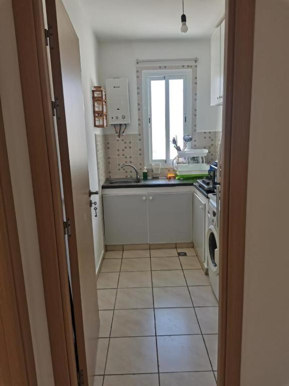 Kuchyň nebo kuchyňský kout v ubytování Appartement F3 en location d'été
