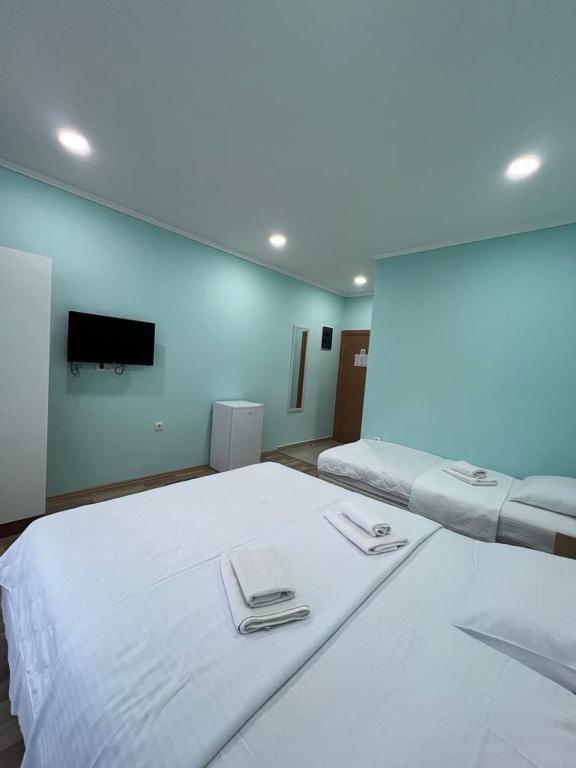 Postel nebo postele na pokoji v ubytování L&I Villa