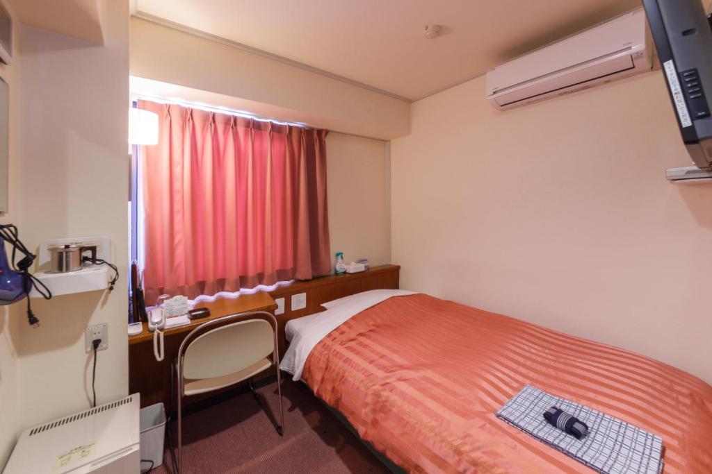 TV a/nebo společenská místnost v ubytování Nagano Daiichi Hotel