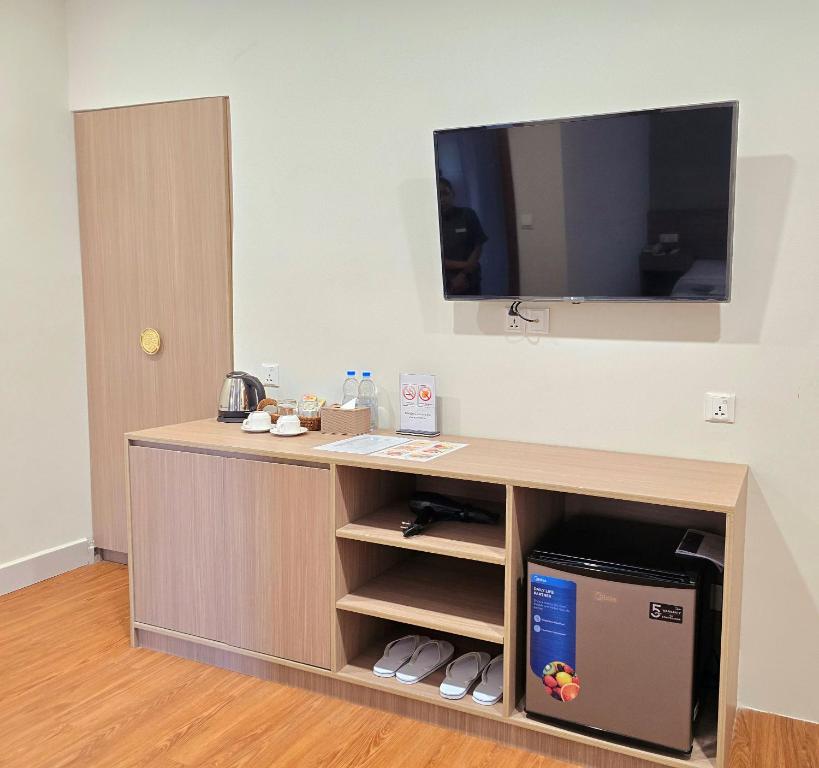 Kuchyň nebo kuchyňský kout v ubytování Joli Hotel