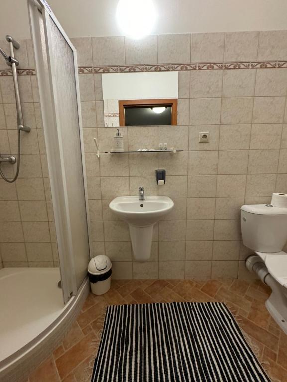 Koupelna v ubytování Pivovarský Hotel