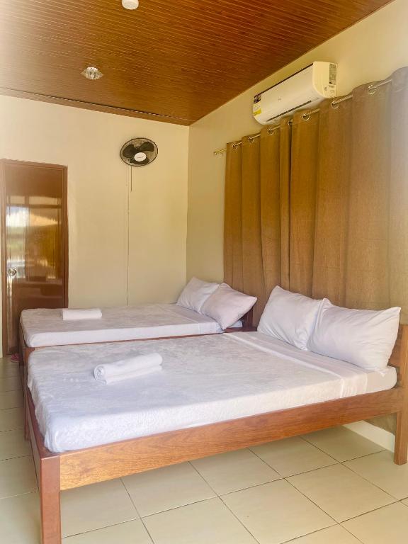 Postel nebo postele na pokoji v ubytování Shing Spa Resort