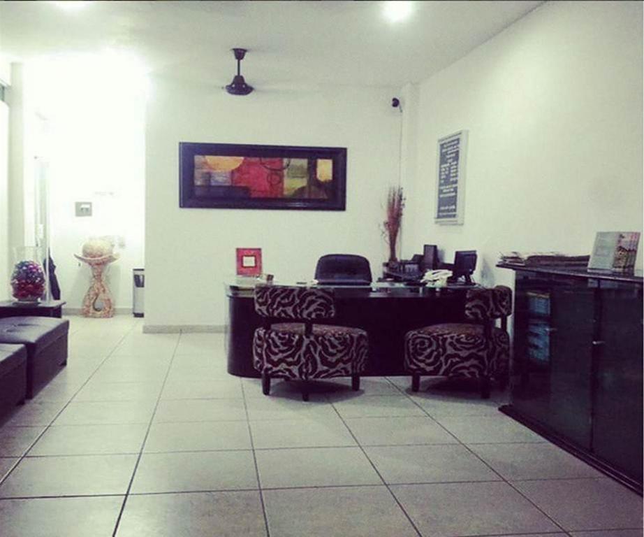 Posezení v ubytování Hotel & Suites Mo Sak