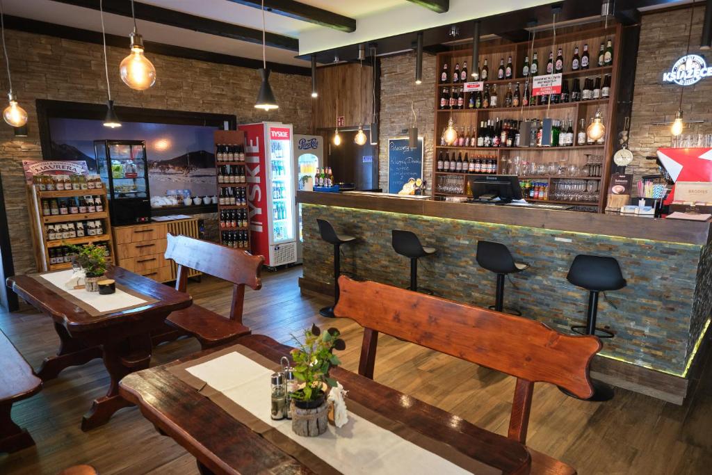 Lounge nebo bar v ubytování Villa Biesisko Przysłup Cisna