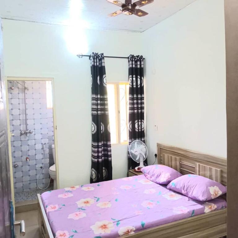 Postel nebo postele na pokoji v ubytování EDEK Guest HOME