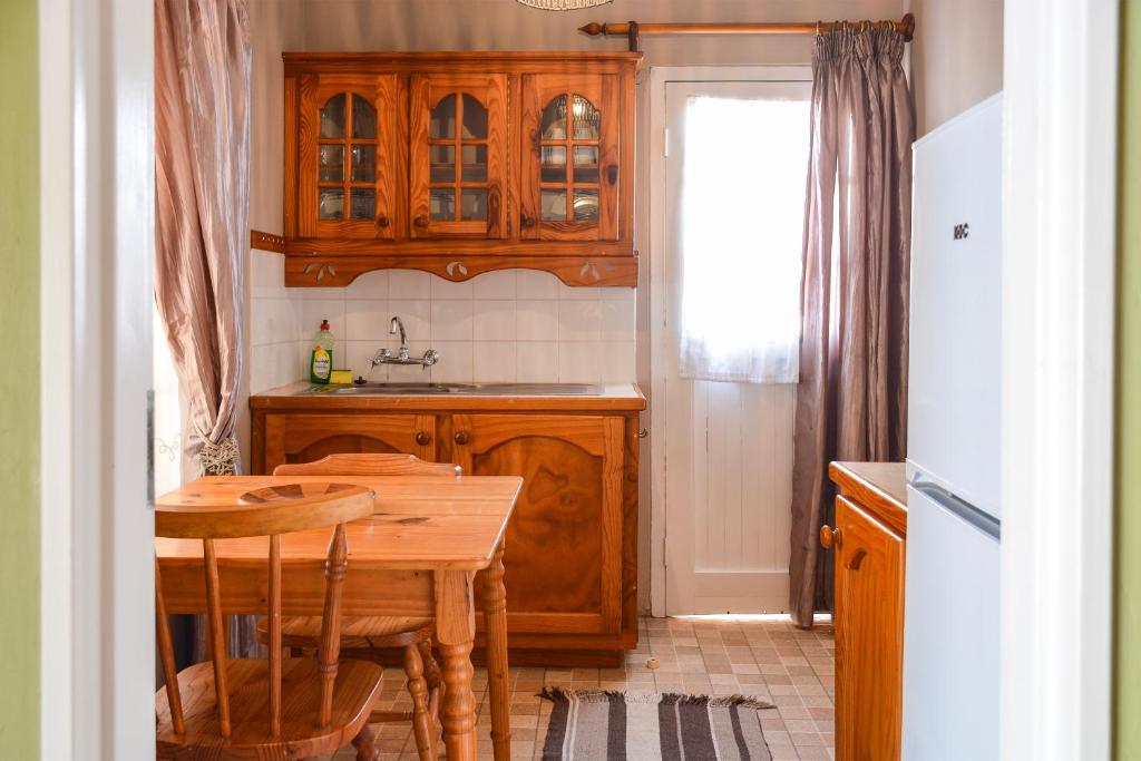 Kuchyň nebo kuchyňský kout v ubytování Biggy Best Boutique Hotel & Self Catering Cottages