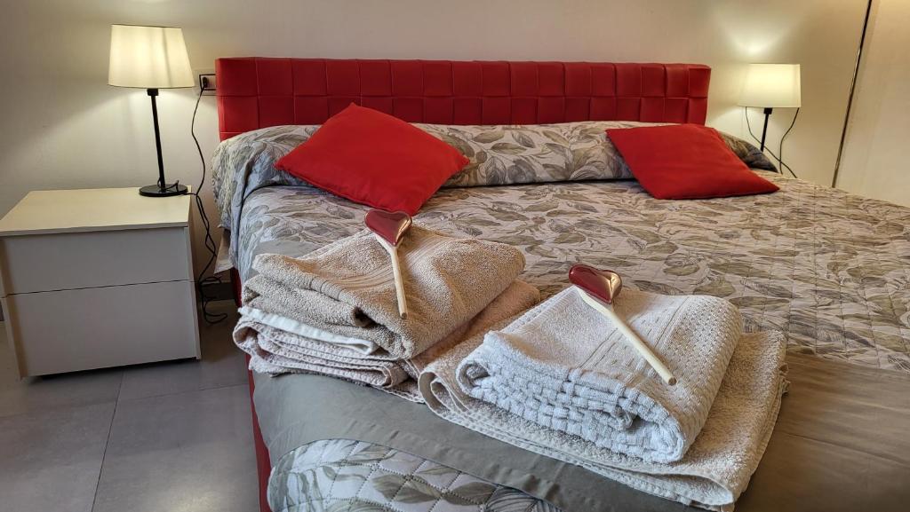 Letto o letti in una camera di Bilocale Manuela in via Signorelli a Garbagnate Milanese