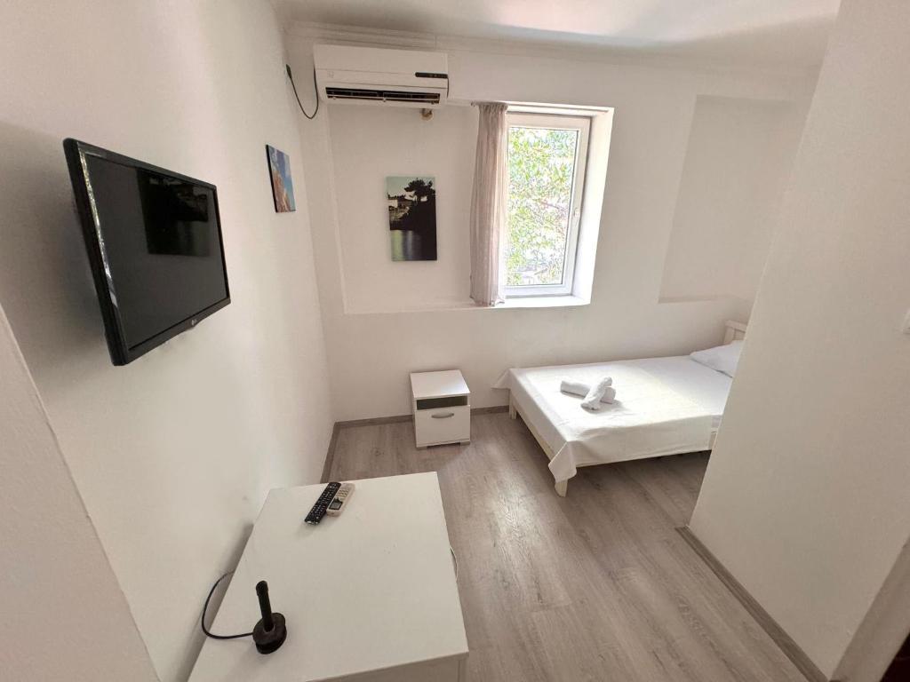 TV a/nebo společenská místnost v ubytování Hotel Istanbul