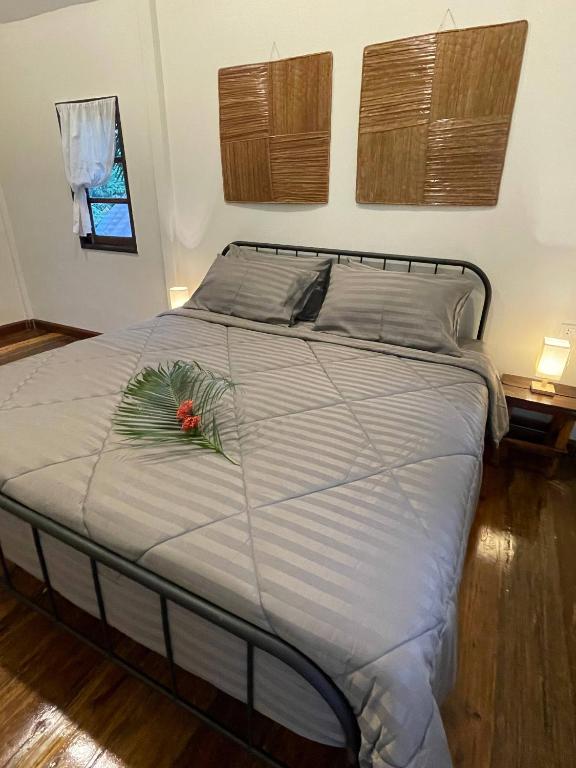 Postel nebo postele na pokoji v ubytování Vanara Bungalows