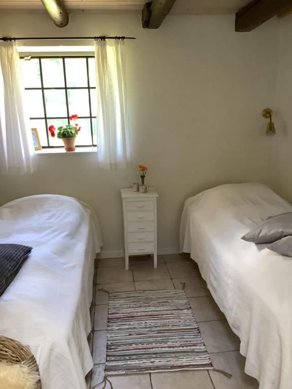 Letto o letti in una camera di Dyrlev Bed & Breakfast