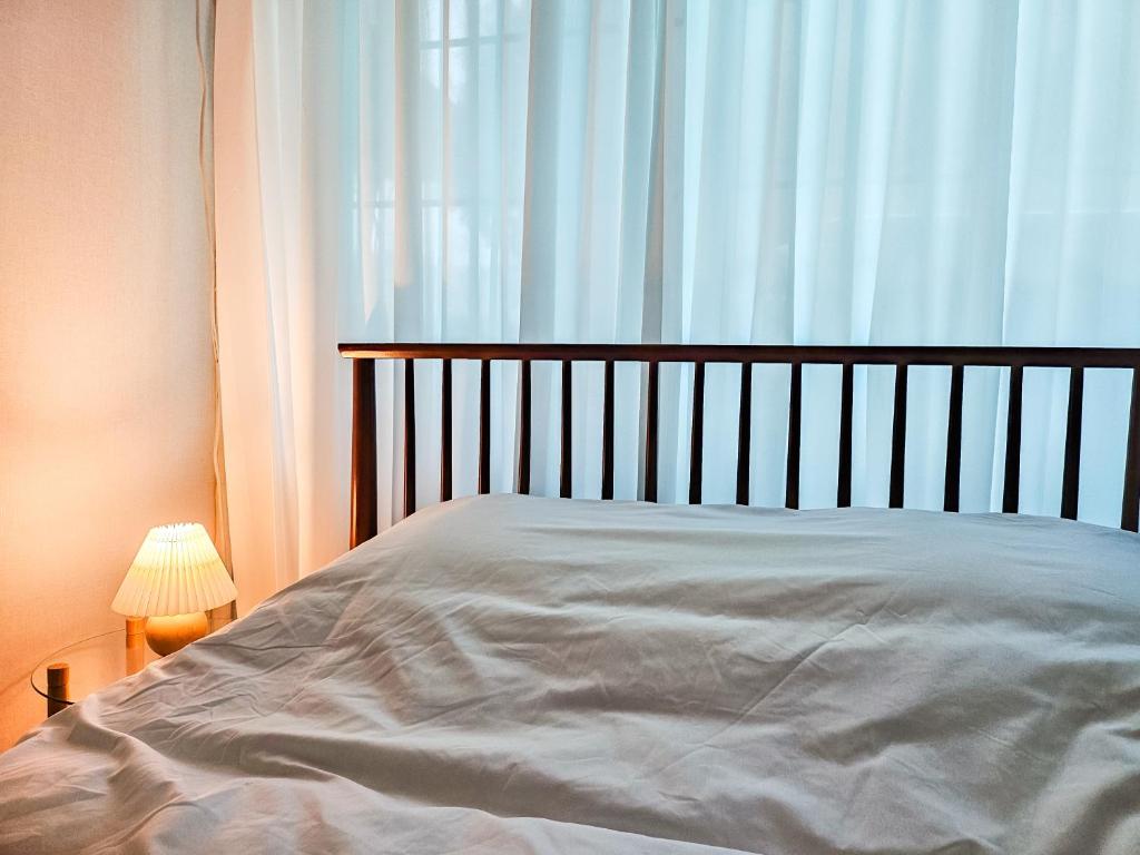 Postel nebo postele na pokoji v ubytování 점미하우스