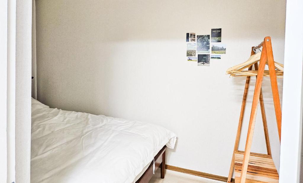 Postel nebo postele na pokoji v ubytování 점미하우스