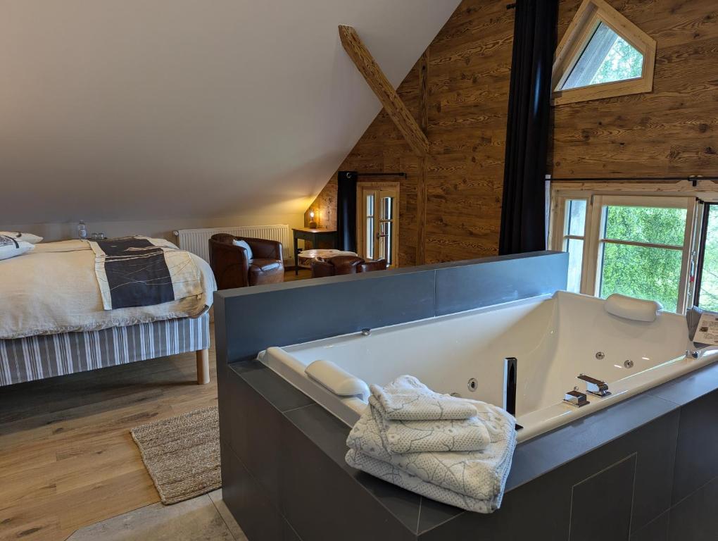 Postel nebo postele na pokoji v ubytování Maison Le ROZET