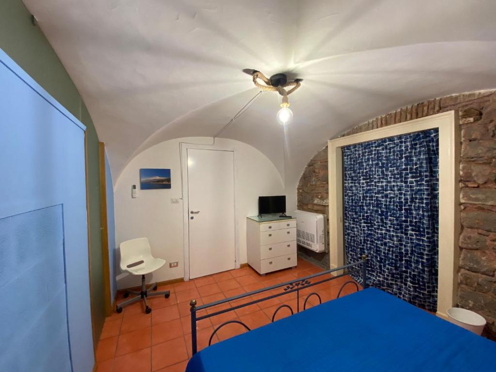 Giường trong phòng chung tại Ciuri tuttu l'annu rooms