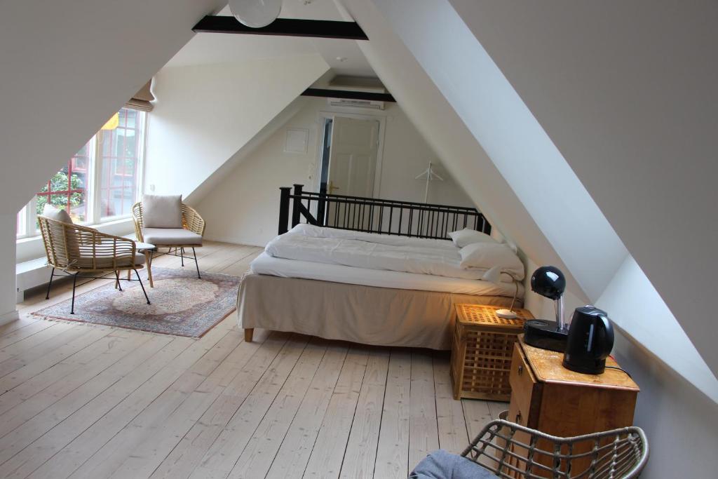 Postel nebo postele na pokoji v ubytování Bjerred B&B