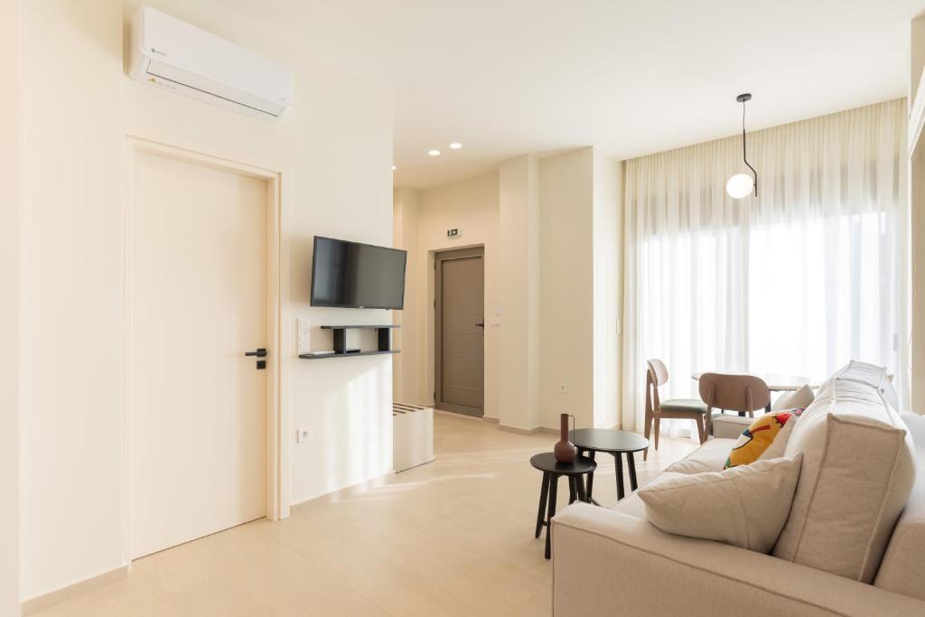 TV a/nebo společenská místnost v ubytování Palm View Suites