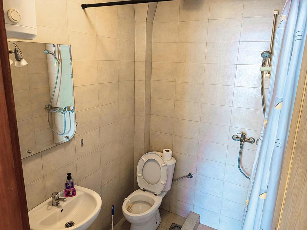 Koupelna v ubytování Amisos Apartmani