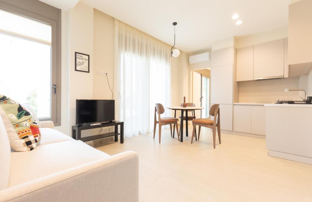 Kuchyň nebo kuchyňský kout v ubytování Palm View Suites
