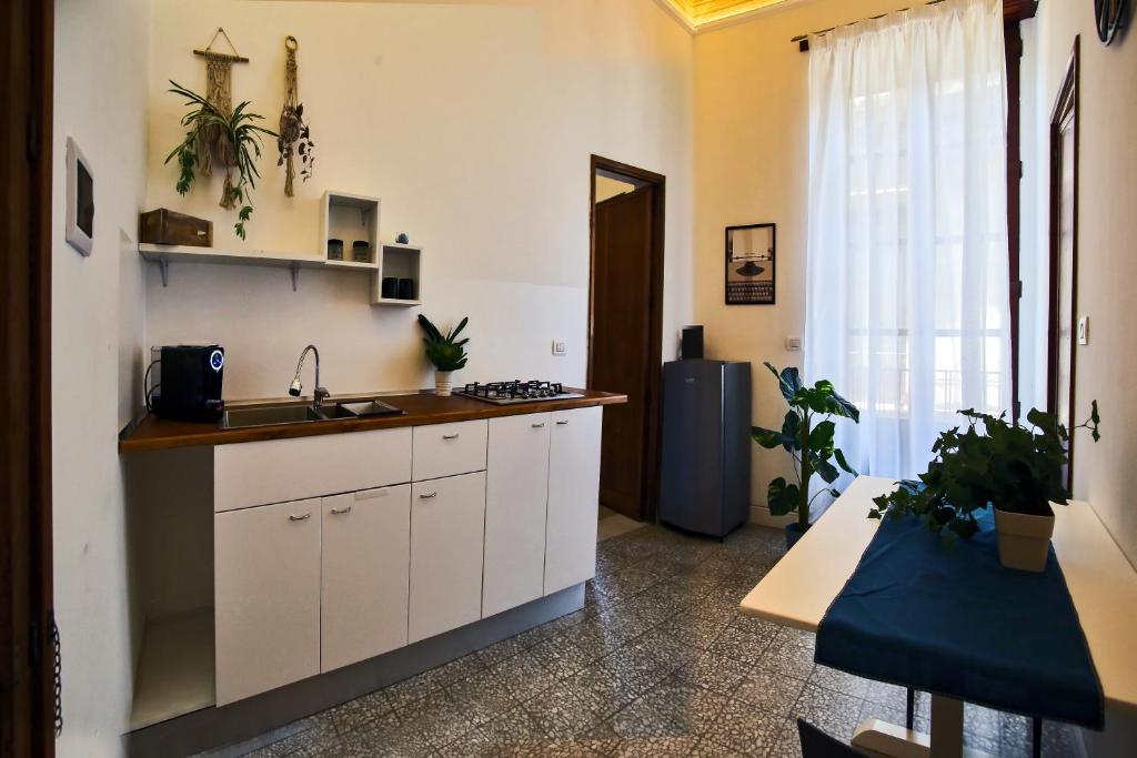 Kuchyň nebo kuchyňský kout v ubytování Tiritù Apartments