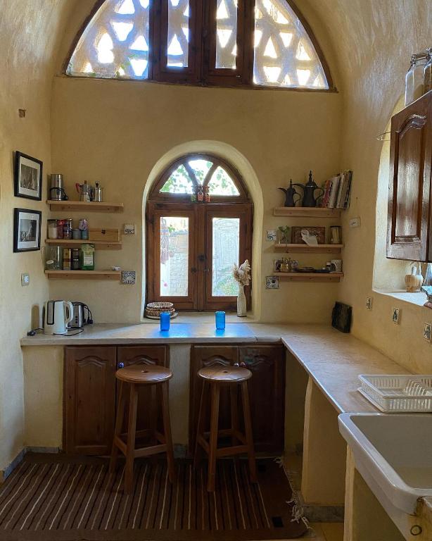 Kuchyň nebo kuchyňský kout v ubytování Beit Ain al Haya