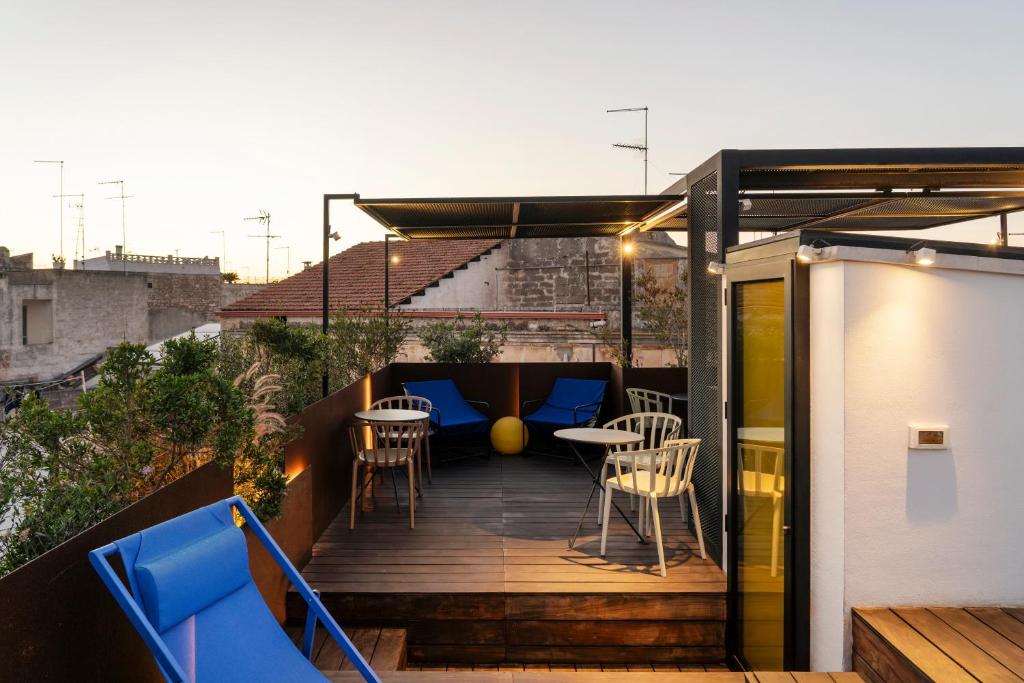 Patio nebo venkovní prostory v ubytování Palazzo Biancofiore, suites & rooftop