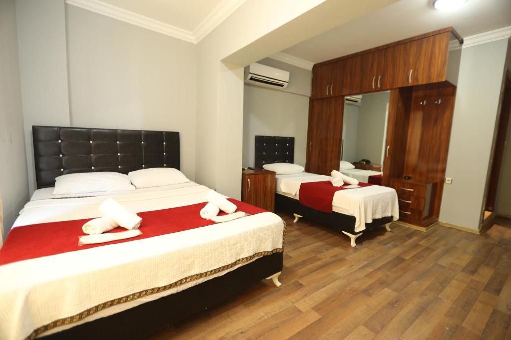 Postel nebo postele na pokoji v ubytování BALŞEN HOTEL
